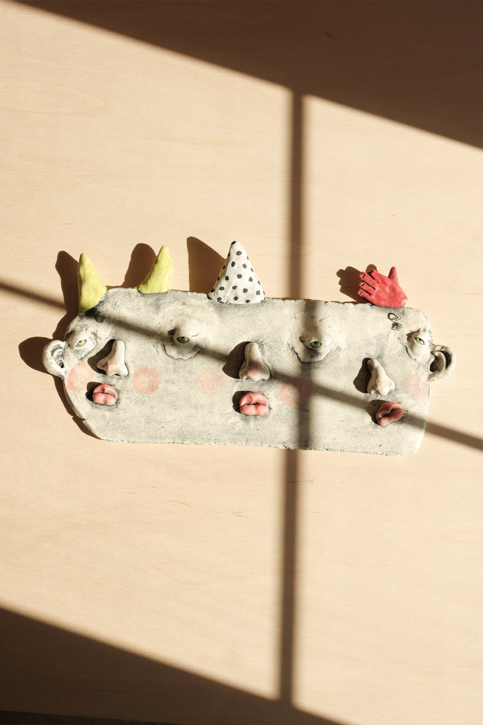 Horns, Hat & Hand Plaque