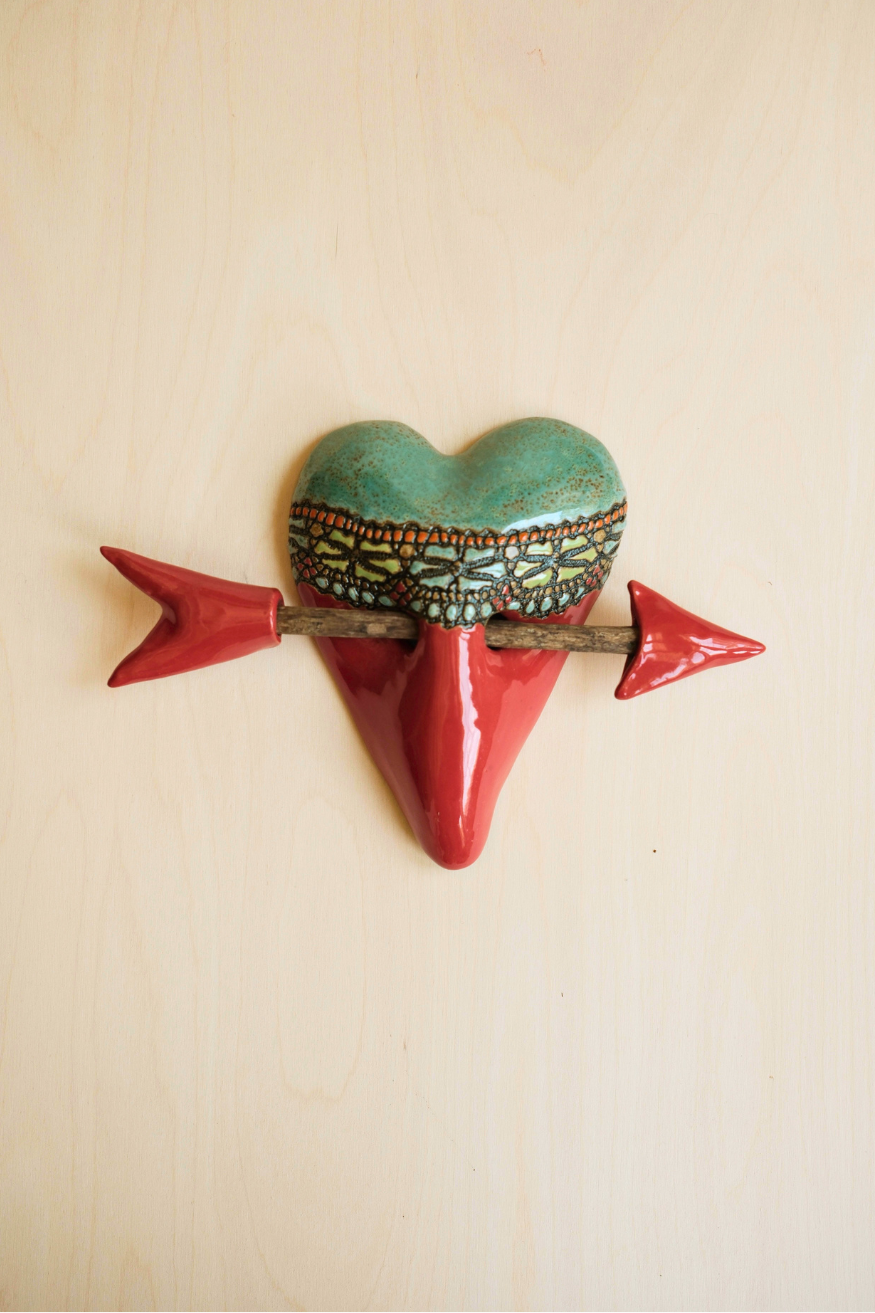 Little Harlequin in Red Heart
