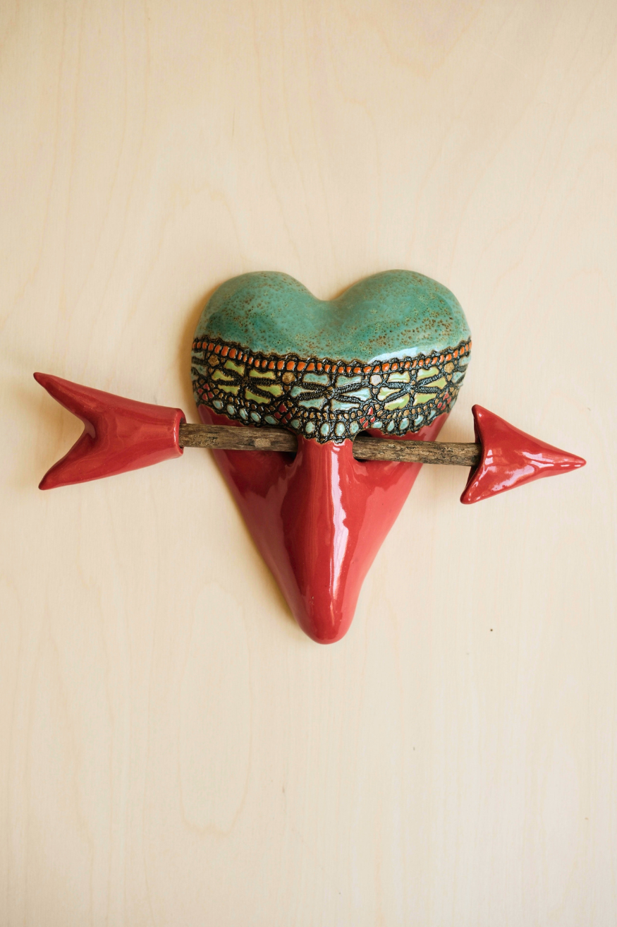 Little Harlequin in Red Heart