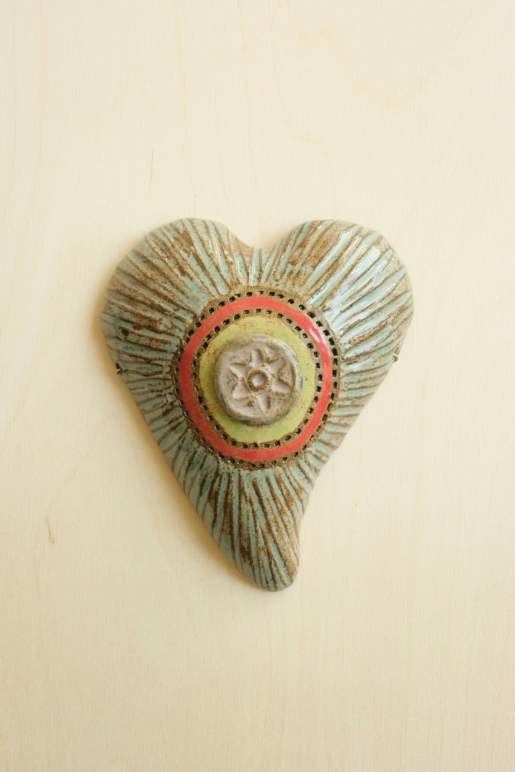 Circle Button in Blue Heart