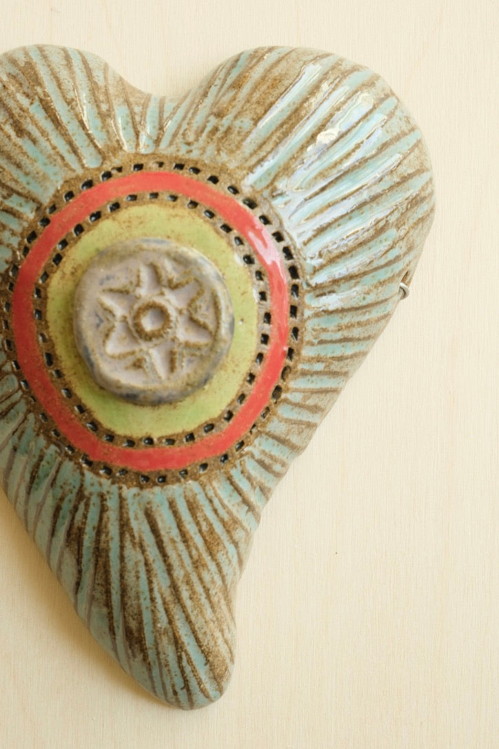 Circle Button in Blue Heart