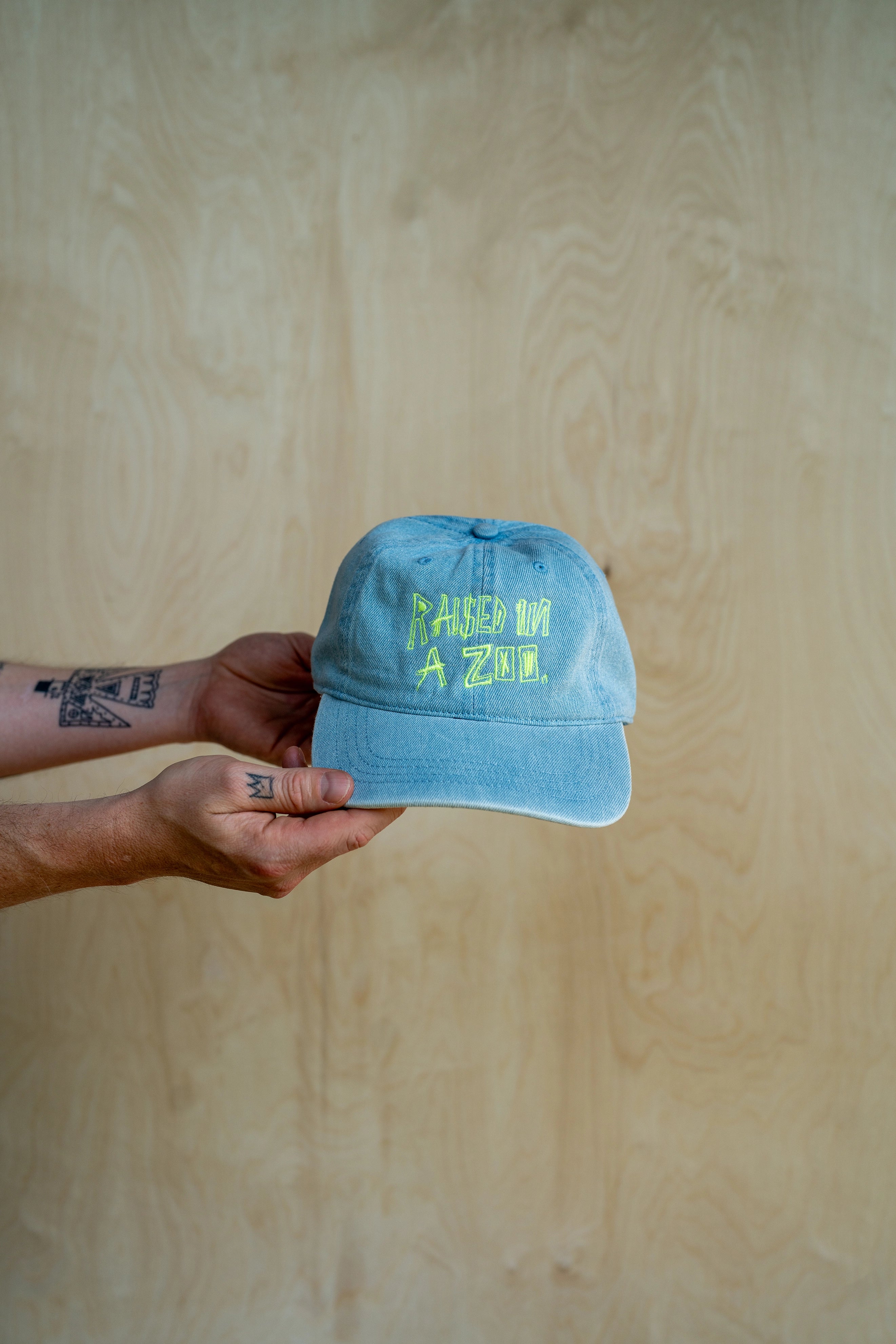 Embroidered Raised in a Zoo Dad Hat Denim