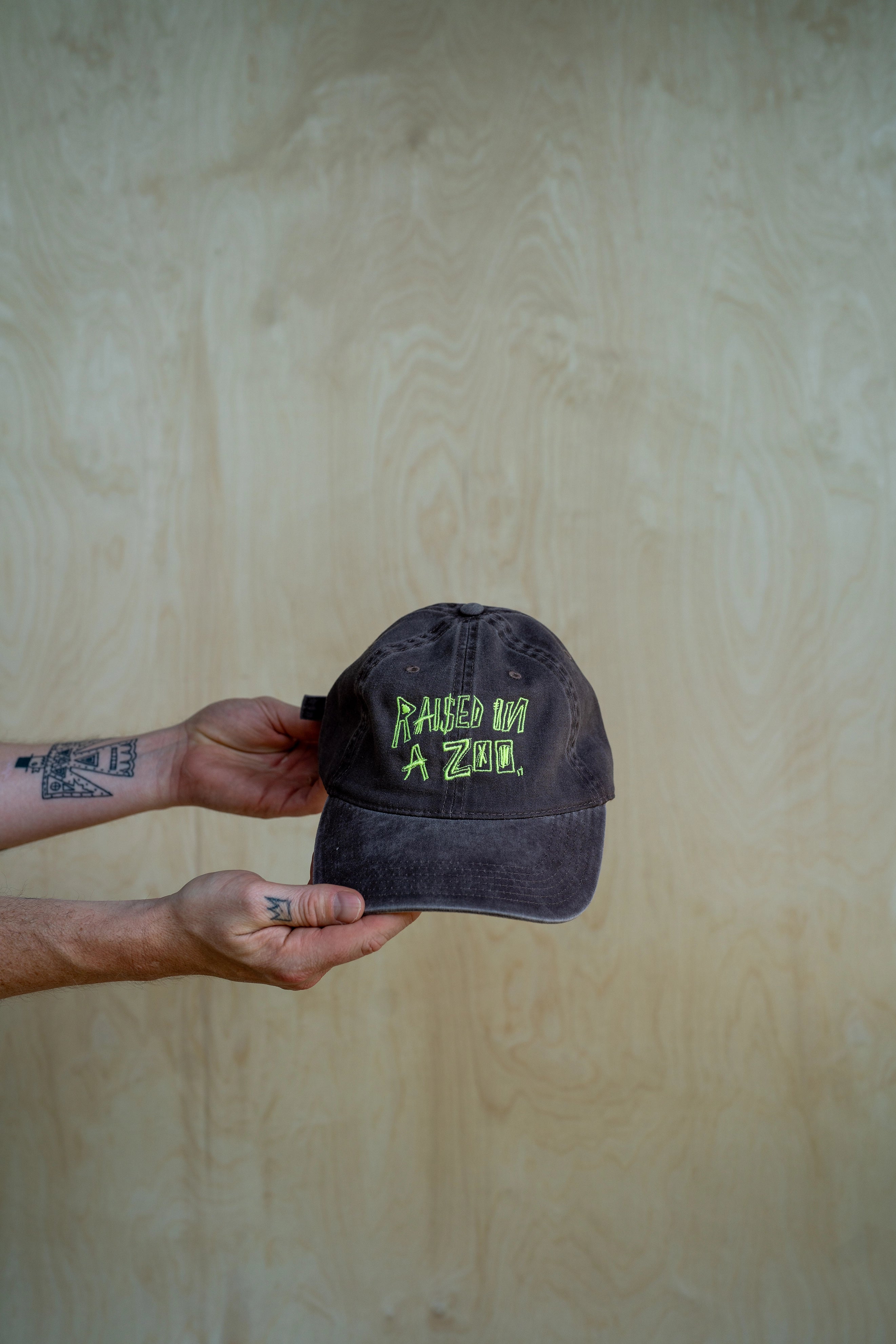Embroidered Raised in a Zoo Dad Hat Dark Chocolate